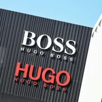 Frasers Group supera el 30% en Hugo Boss y roza el umbral de la oferta por el resto
