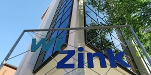 WiZink reduce sus pérdidas a menos de la mitad en el primer semestre, a la espera de Unicaja